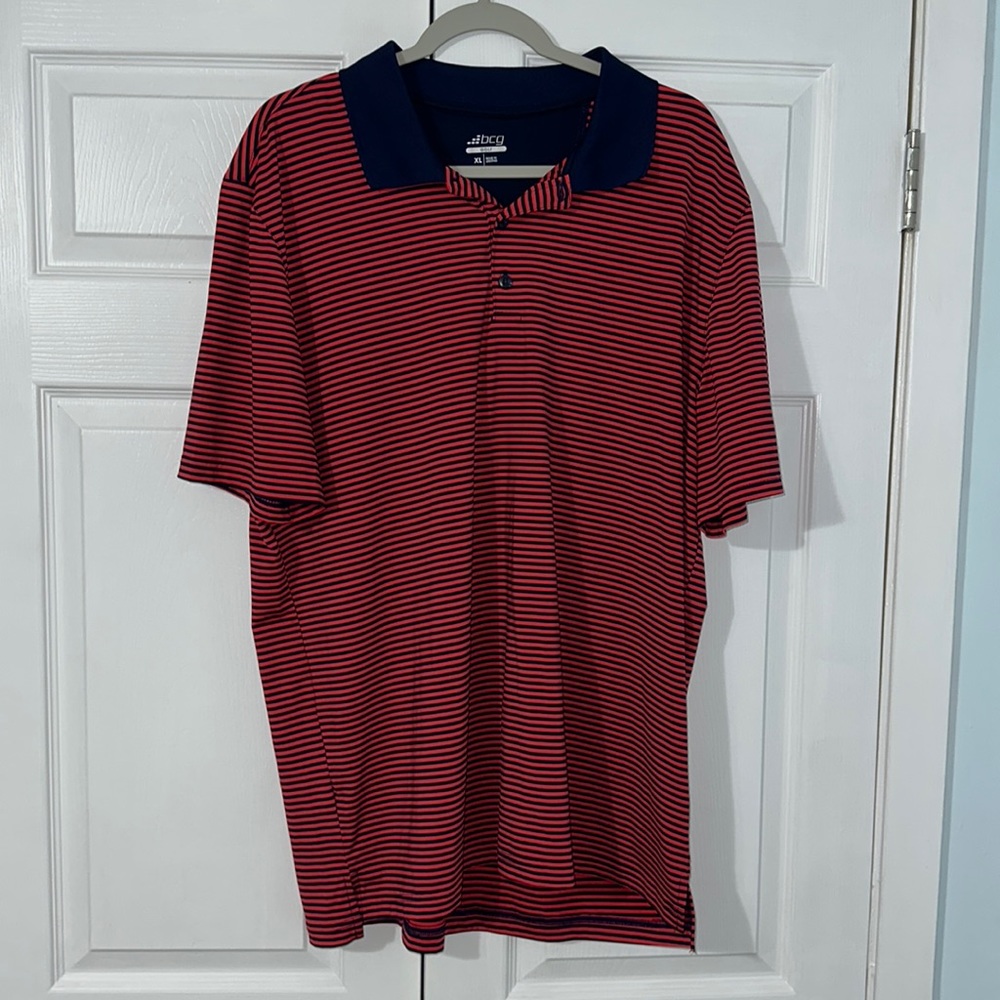 Men’s XL BCG golf polo. Never worn.